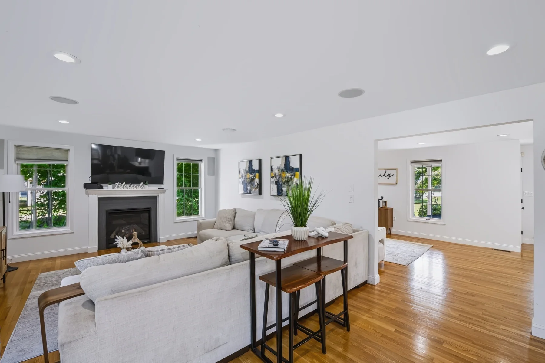 Family room with fireplace and windows